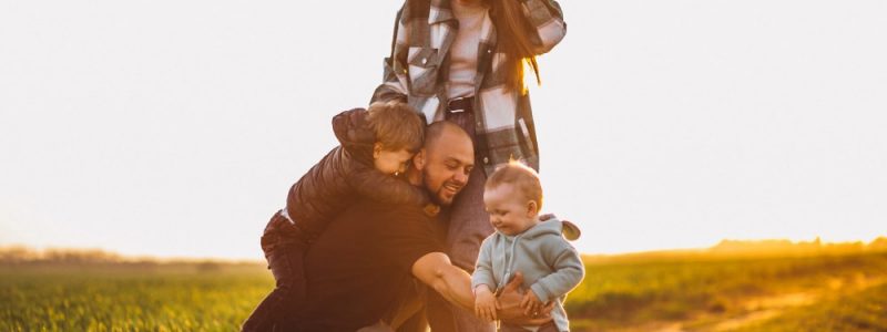 happy-family-having-fun-in-the-field-on-the-sunset happy-family-having-fun-in-the-field-on-the-sunset